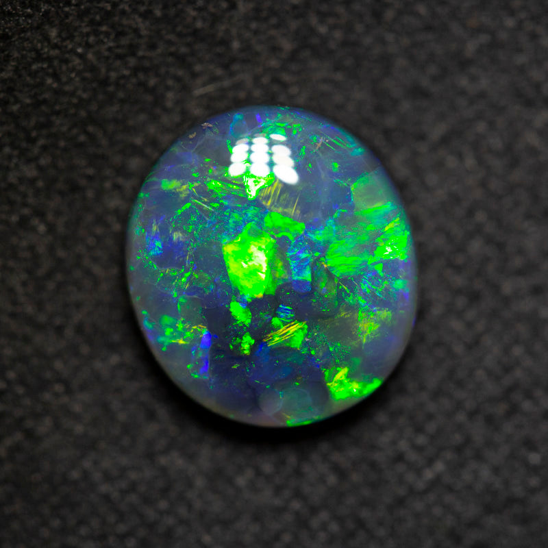 2.42 ct black opal 10x9x4.3mm