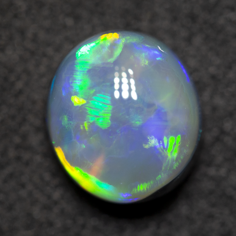 2.43 ct black opal 8.8x7.9x5.8mm
