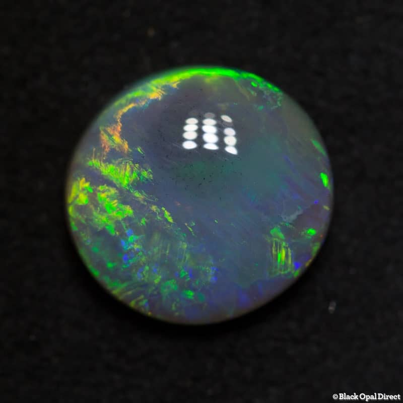 2.44 ct semi black opal 10x8x4m