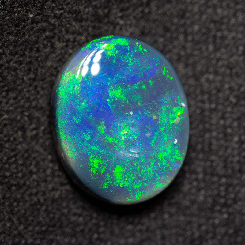 2.45 ct black opal 10.6x8.5x4.2mm