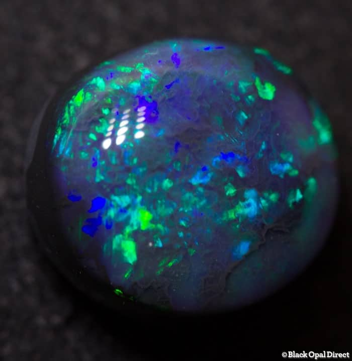 2.47 ct black opal 9.6x8.5x5mm
