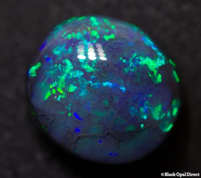 2.47 ct black opal 9.6x8.5x5mm