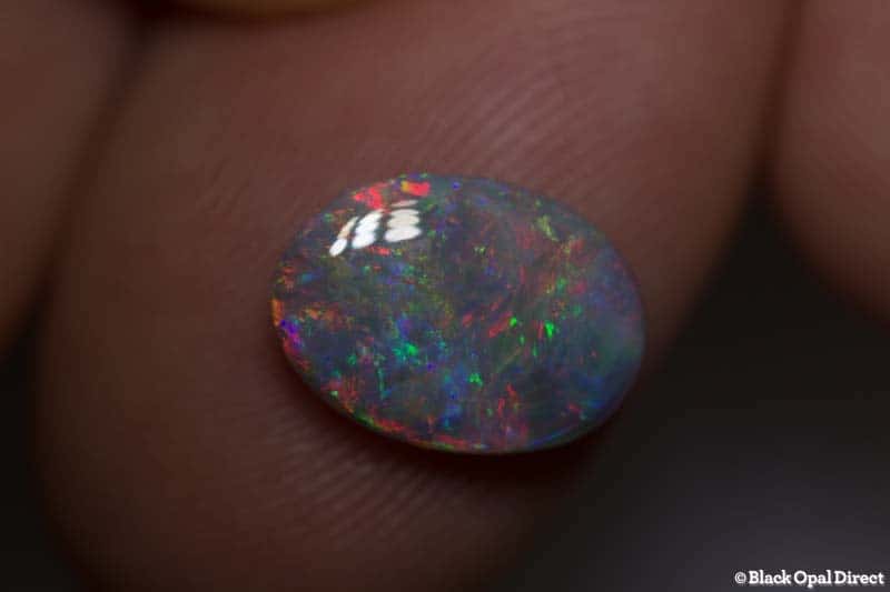 2.47 ct semi black opal 11.5x8.5x4mm
