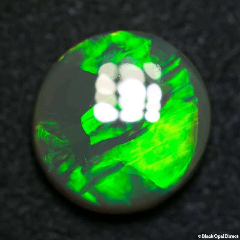 2.48 ct black crystal opal 10mm round x4mm
