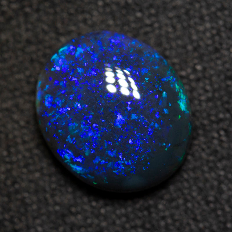 2.50 ct black opal 10.2x8.9x4.5mm