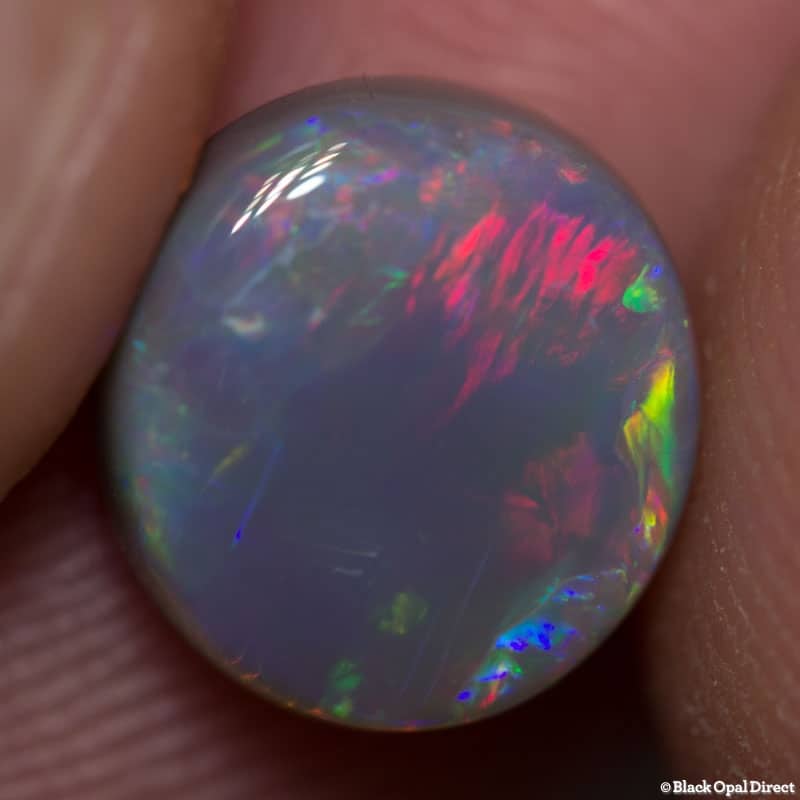 2.51 ct semi black opal 10x9x4mm