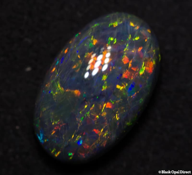 2.51 ct double sided black opal gem 11x7x5mm