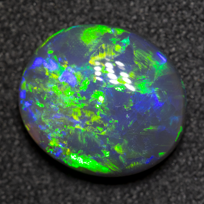 2.52 ct black opal 10.6x9.4x4.1mm