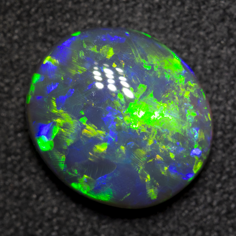 2.52 ct black opal 10.6x9.4x4.1mm