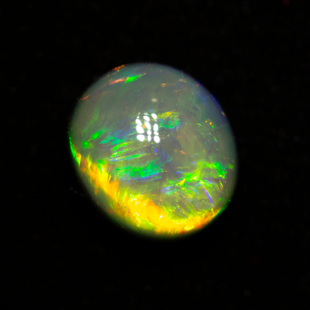 2.54 ct gem black opal 8.6x7.5x6.5mm