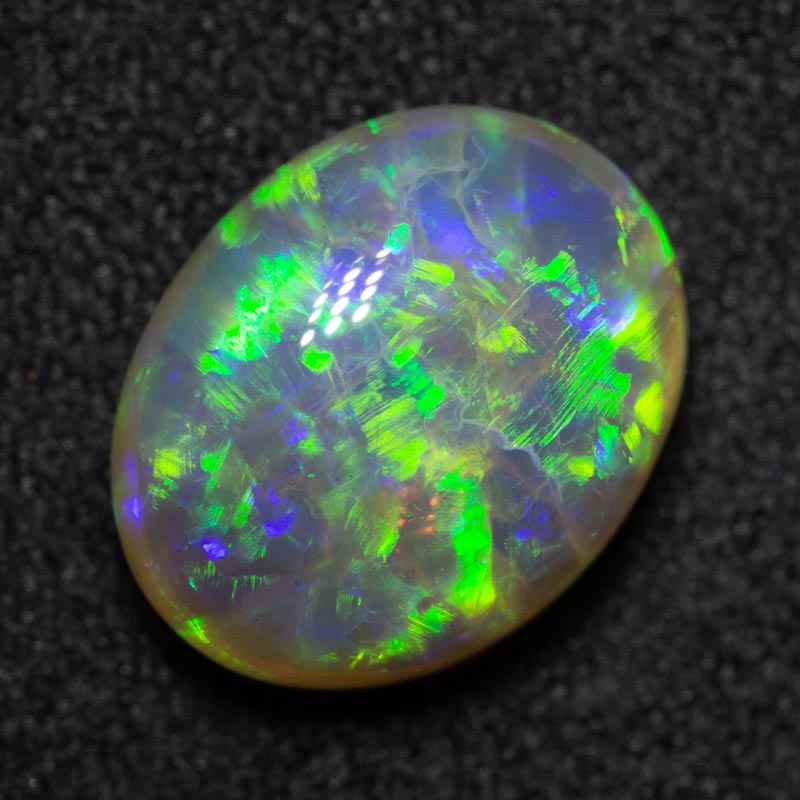 2.60 ct double-sided crystal opal 10.4x8.2x4.9mm