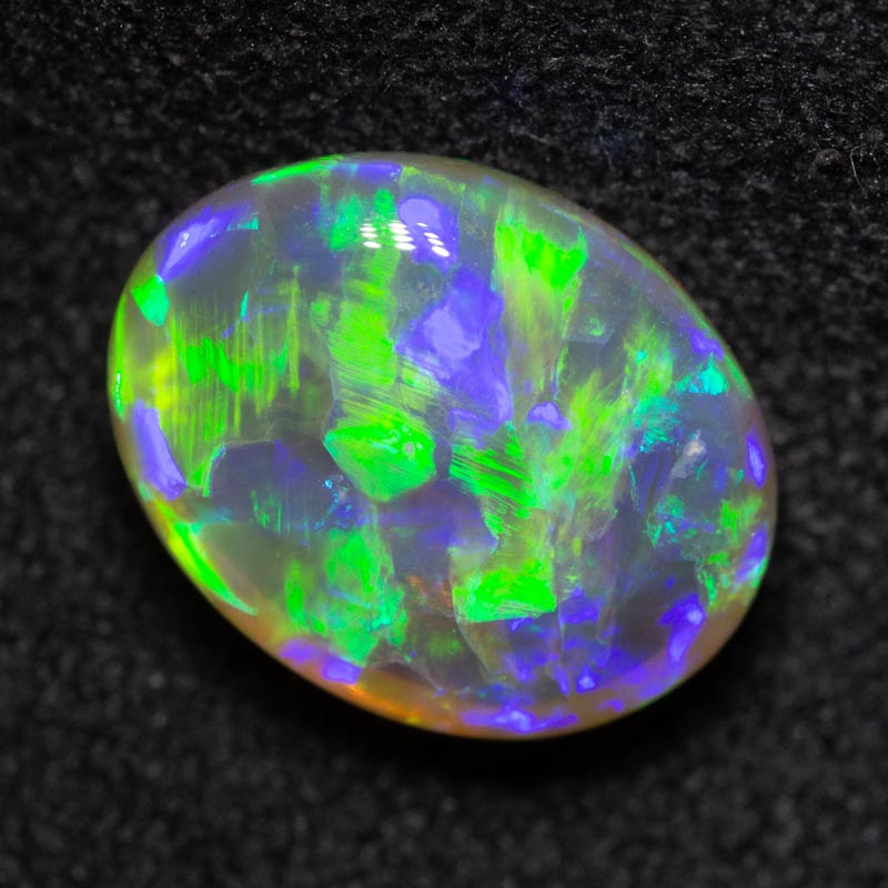 2.60 ct double-sided crystal opal 10.4x8.2x4.9mm