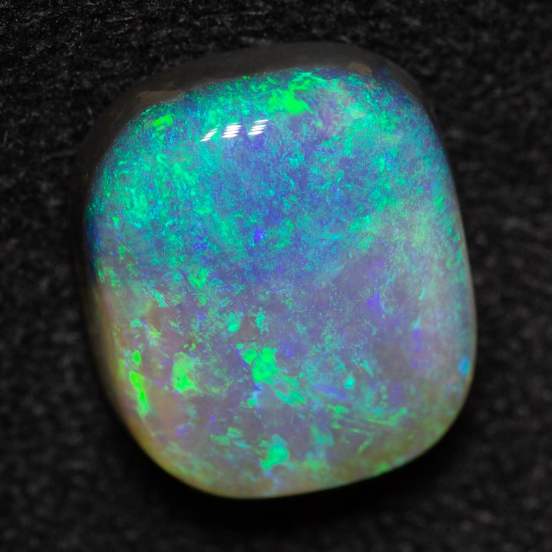 2.64 ct dark opal 9.7x8.4x4.1mm