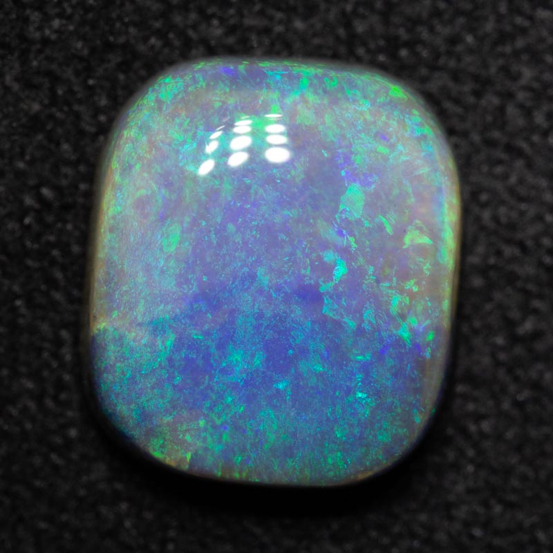 2.64 ct dark opal 9.7x8.4x4.1mm