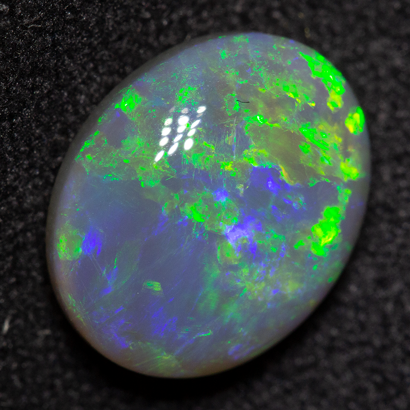 2.66 ct dark opal 10.8x8.9x4.6mm