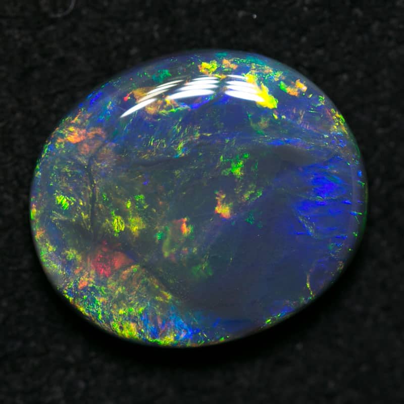 2.69 ct black opal 11x10x3mm