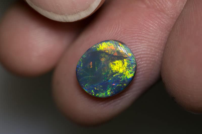 2.69 ct black opal 11x10x3mm