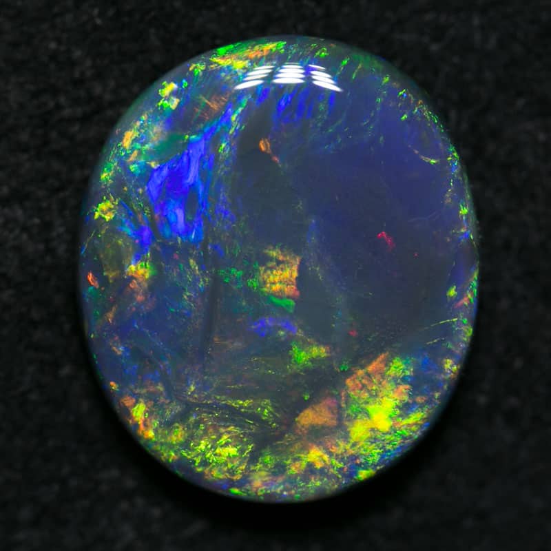 2.69 ct black opal 11x10x3mm