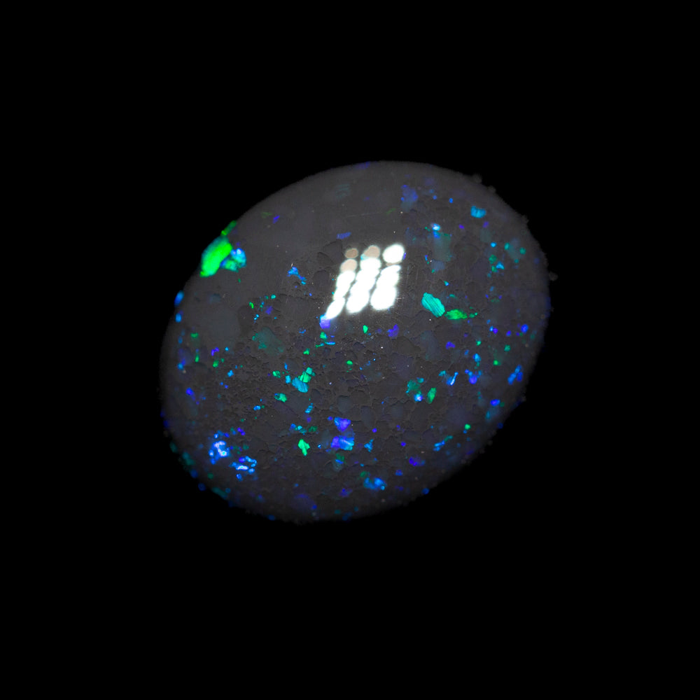 2.71 ct black opal 9.7x7.9x5.5mm