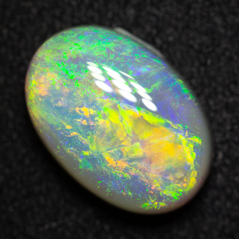 2.72 ct dark opal 11.3x7.9x4.2mm