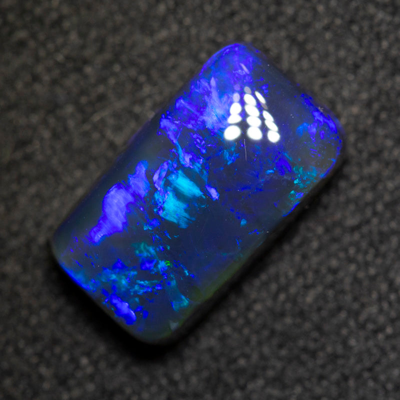 2.73 ct black opal 11.1x6.4x4.3mm