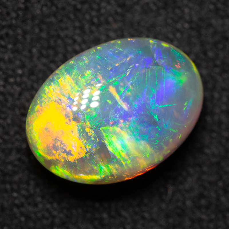 2.74 ct double-sided crystal opal 10.1x7.3x5.9mm