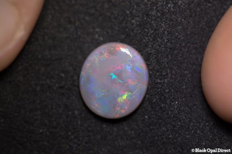 2.78 ct semi black opal 12x11x3mm