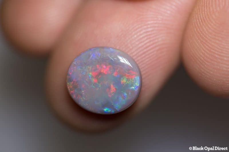 2.78 ct semi black opal 12x11x3mm