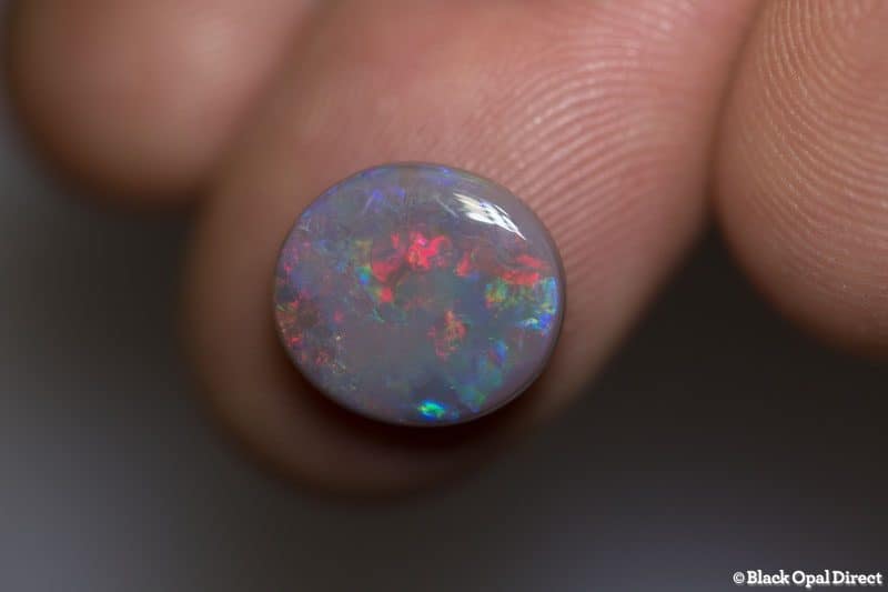2.78 ct semi black opal 12x11x3mm
