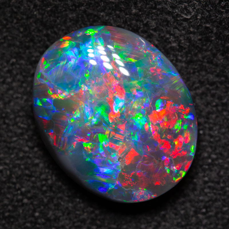 2.79 ct gem black opal 11x8.9x4.3mm