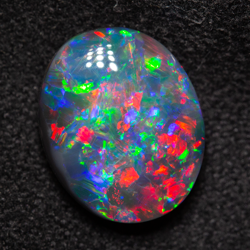2.79 ct gem black opal 11x8.9x4.3mm