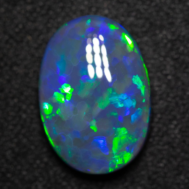 2.80 ct black opal 12.2x8.6x4mm