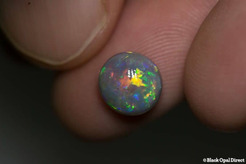 2.80 ct dark opal 9mm round x5mm thick