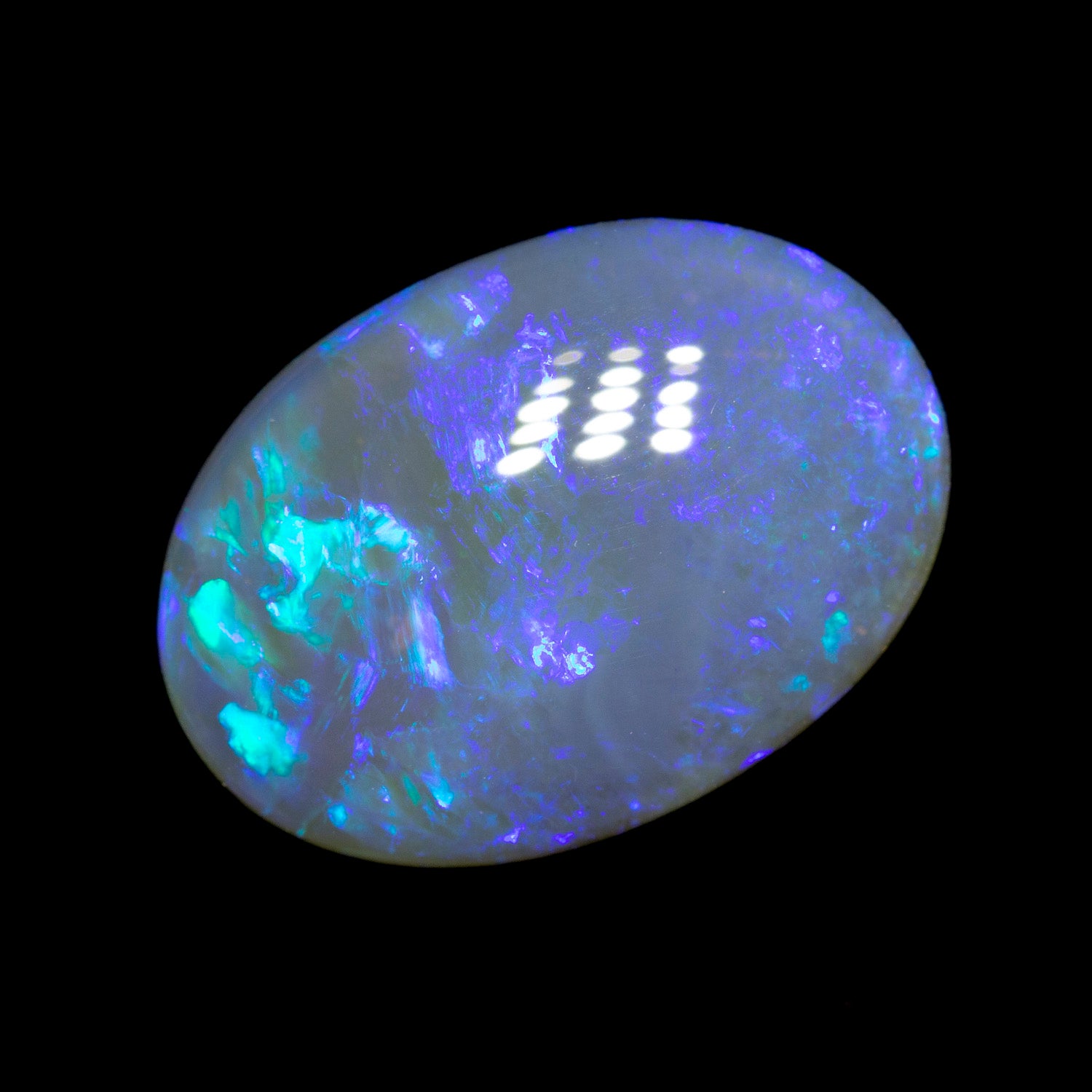 2.82 ct black crystal opal 13.5x9.6x3.4mm