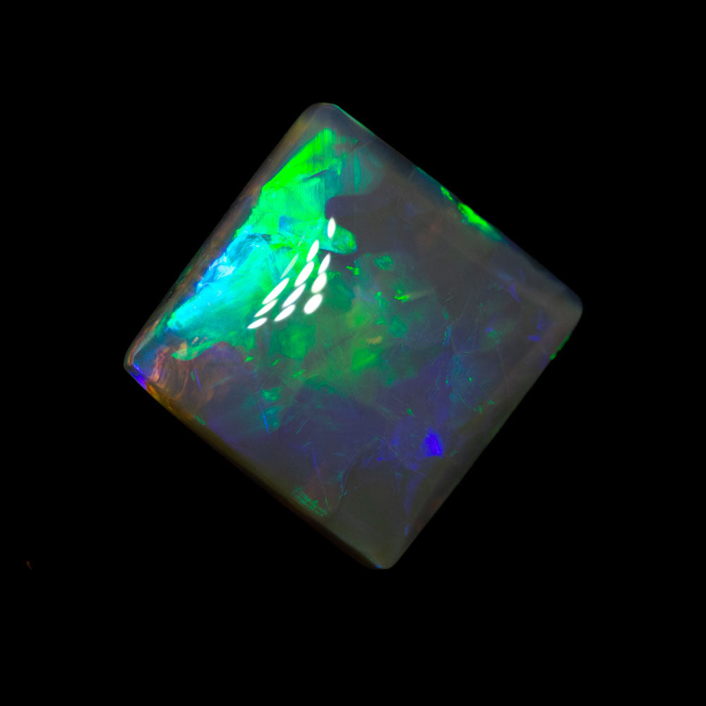 2.87 ct black crystal opal 9.6x9.6x4.1mm
