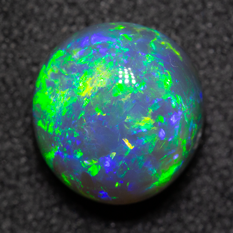 2.87 ct black opal 9x8.6x6.5mm