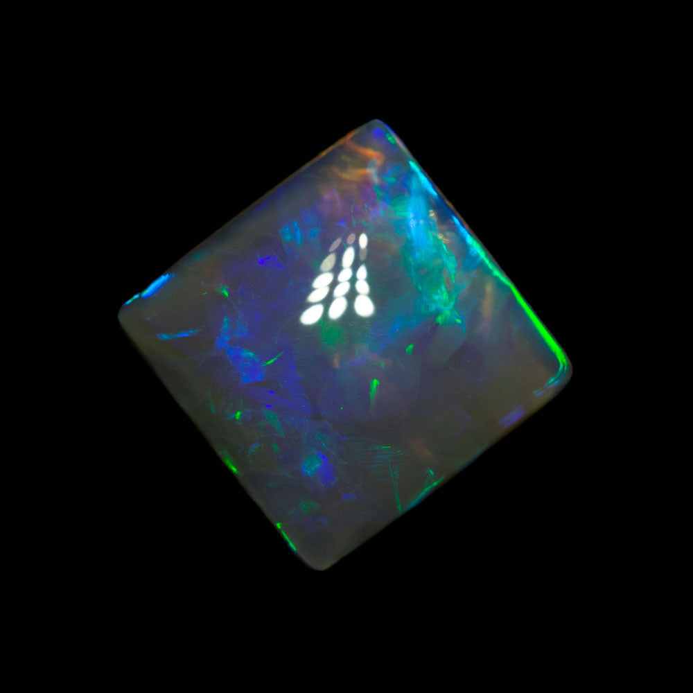 2.87 ct black crystal opal 9.6x9.6x4.1mm