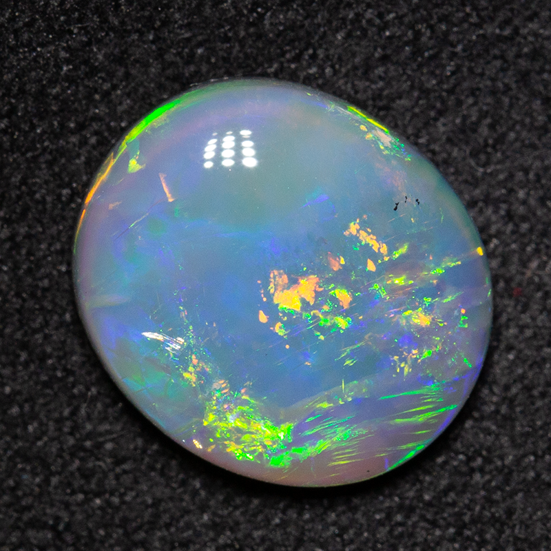 2.88 ct dark opal 11x10x3.5mm