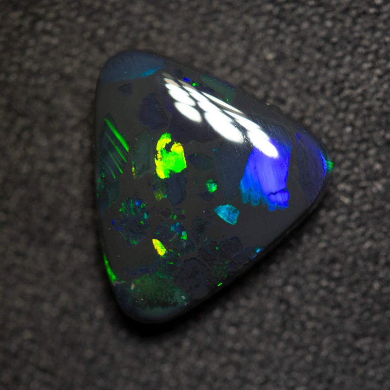 2.89 ct black opal 11.8x10.3x4.2mm