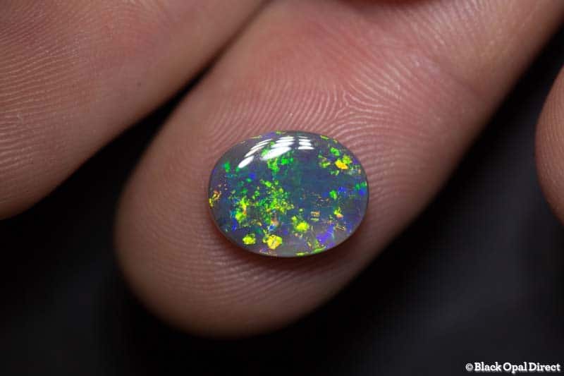 2.69 ct semi black opal 12x9x3mm