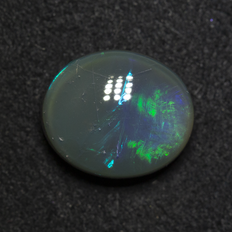 2.97 ct black opal 10.5x8.8x5mm