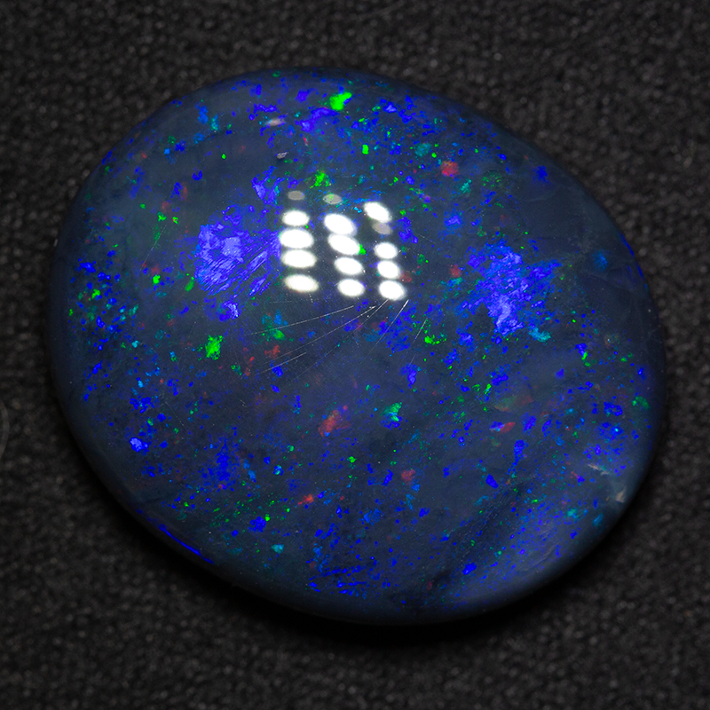 21.47 ct gem black opal 22.4x18.9x7.4mm