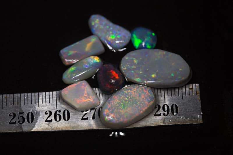 24.90 ct opal rubs 8 pieces