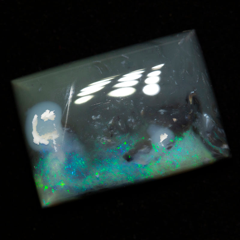 25.05 ct black opal 23.5x16.3x7.3mm