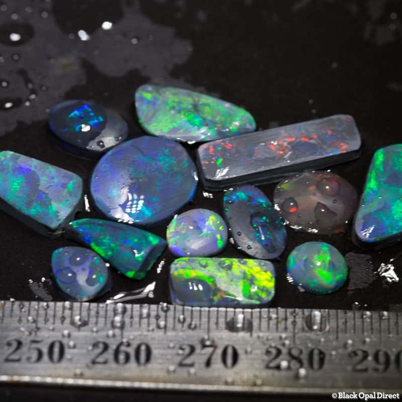 26.19 ct opal rubs parcel 13 pieces