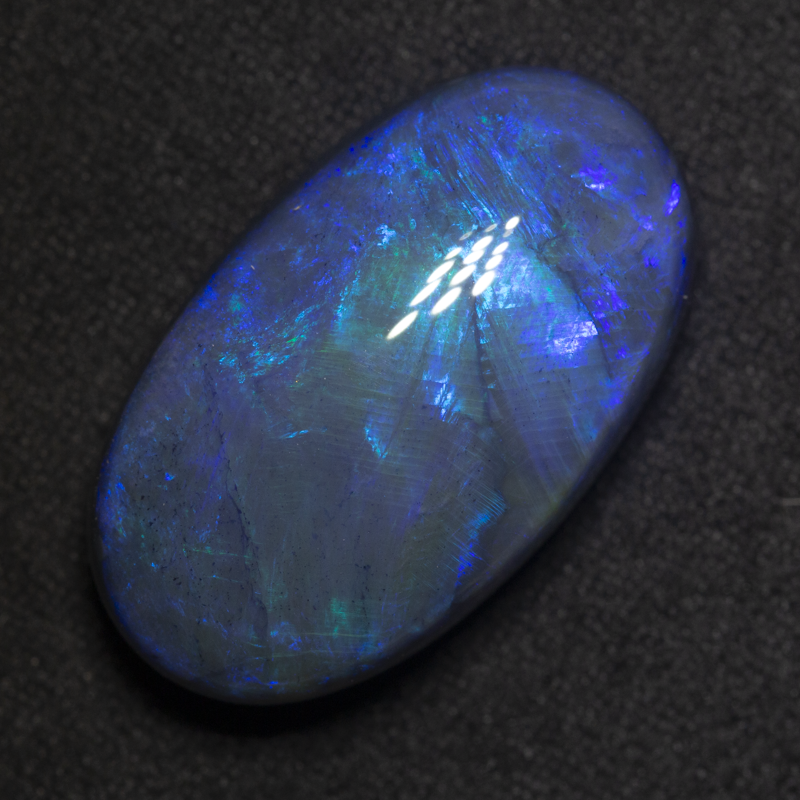 27.52 ct black opal 27x15.5x10.3mm