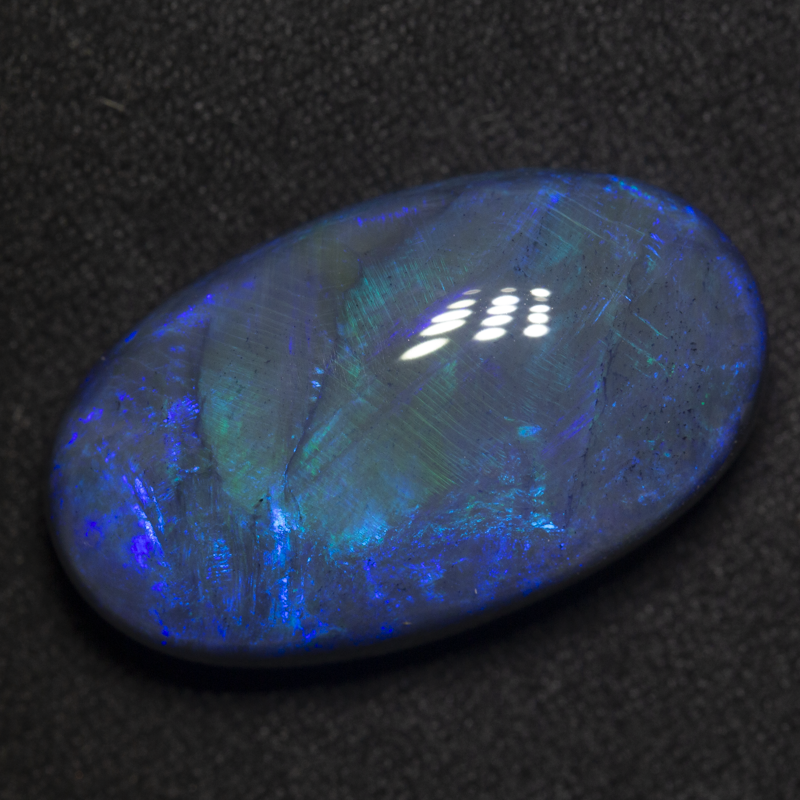 27.52 ct black opal 27x15.5x10.3mm