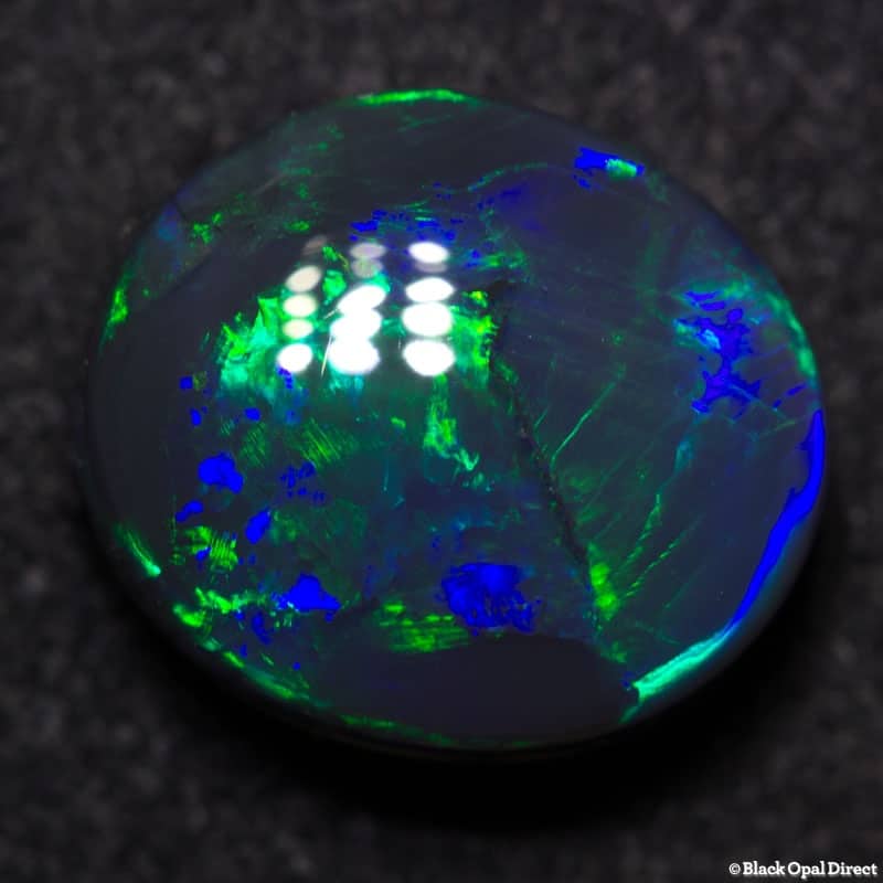3.03 ct black opal gem 10x9x5mm
