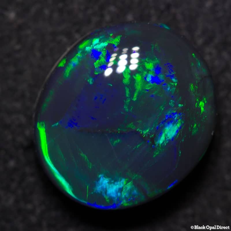 3.03 ct black opal gem 10x9x5mm