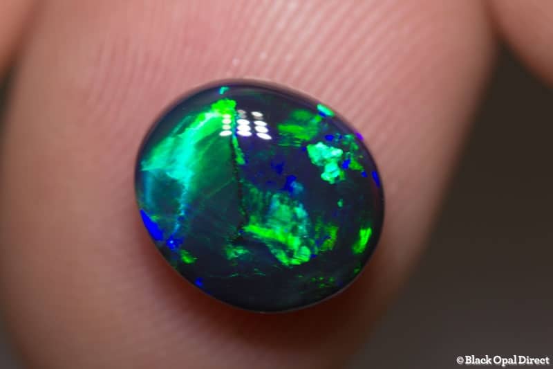 3.03 ct black opal gem 10x9x5mm